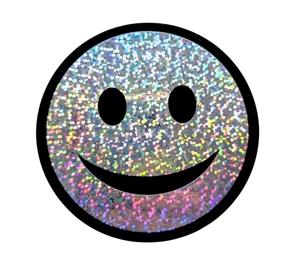 Trblietavá vodeodolná nálepka Smiley