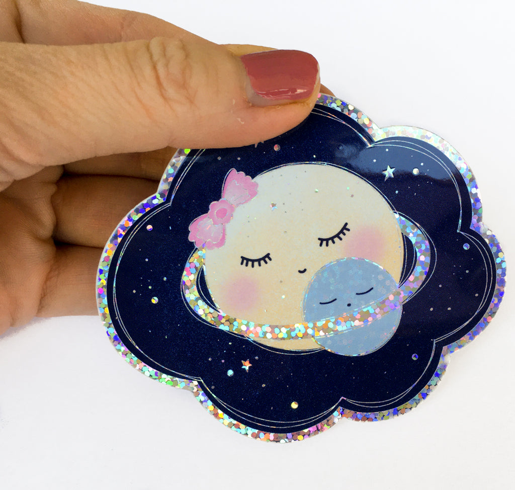 Trblietavá vodeodolná nálepka Planéta