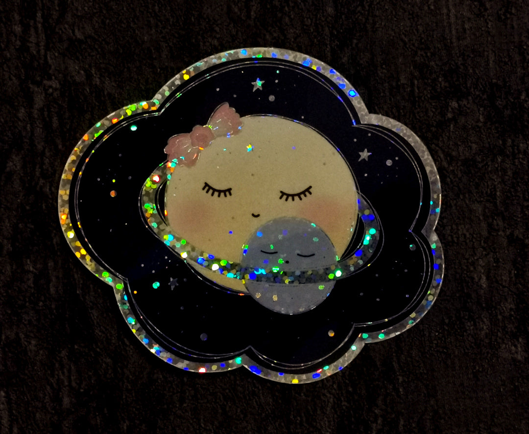 Trblietavá vodeodolná nálepka Planéta